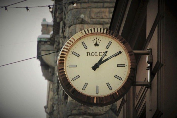 A trademark can be a combination of illustration and text Rolex logo on the clock